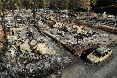 A view of the remains of burned houses.